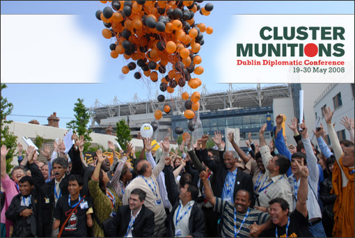 Campaigners celebrate adoption of the Convention on Cluster Munitions in Dublin at end of negotiations in May 2008.